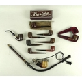 A collection of early to mid 20th century pipes including an unusual long stemmed German pipe, the c... 