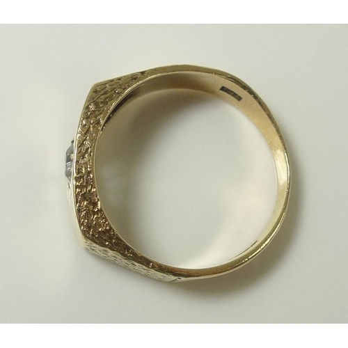 814 - A gentleman's 9ct gold ring set with white stone, likely moissanite or sapphire, size U, 6g.