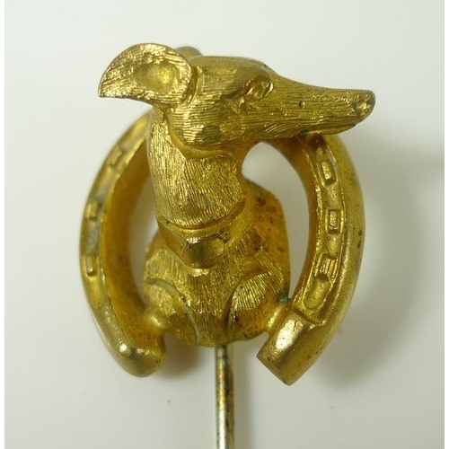 817 - An Intaglio stick pin with fox's mask, together with a stick pin set with a large oval cabochon garn... 