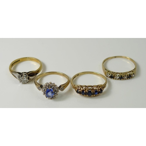 818A - A collection of four rings, each hallmarked to the bands, comprising an 18ct gold ring solitaire dia... 