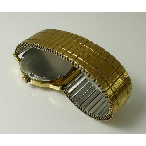 820 - An Omega Geneve gentleman's wristwatch, circa 1974, gold plated with steel caseback, gold dial with ... 