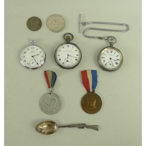 824 - A collection of coins and vertu, comprising a silver teaspoon with rifle handle, engraved 'Berks.H.G... 