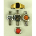 A collection of gentleman's wristwatches, including a Seiko automatic, the red dial with day and dat... 