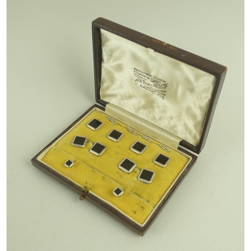 841 - A set of 9ct white gold and onyx studs, comprising a pair of cufflinks, a pair of collar studs, and ... 