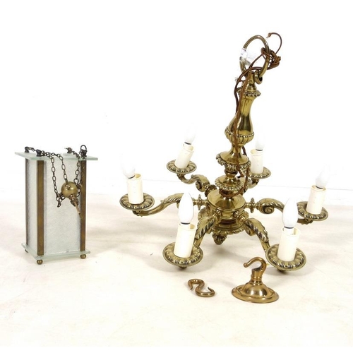 863 - A 19th century five brass candelabra with scroll arms and an acorn terminal, 58cm high, together wit... 