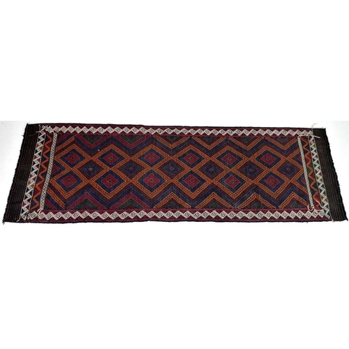 871 - A Suzni Kilim runner rug, with eighteen diamond pendants made of latchhook borders i red, dark blue,... 