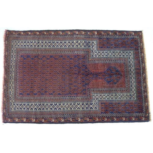 876 - A Baluchi prayer rug, with dark blue ground, dark red patterned field, cream borders, 147 by 97cm.