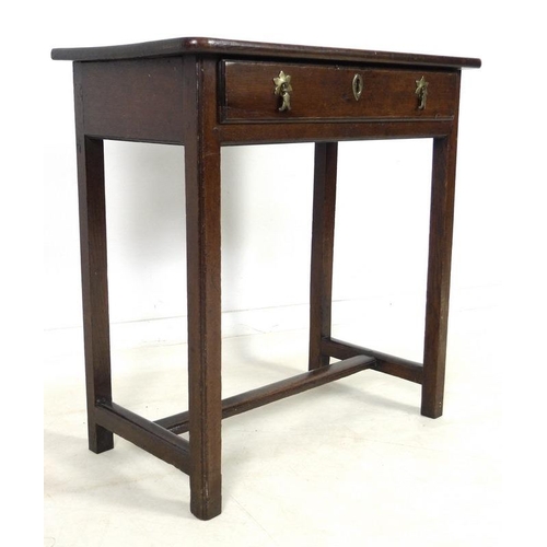 878 - An early 18th century oak side table, single frieze drawer with moulded edges, brass drop handles an... 