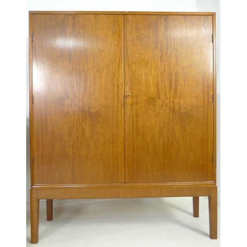 882 - A Danish mahogany sideboard, mid 20th century, by C. B. Hansens, Kopenhagan, four drawers with brass... 