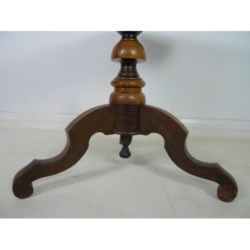 947 - An Italian marquetry tilt top table, Sorrento circa 1860, the rectangular surface with canted corner... 