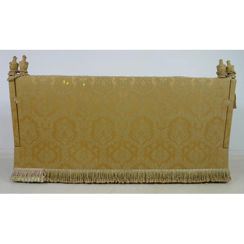 948 - A Knowle settee, circa 1920, upholstered in gold coloured brocade with fringing to the back, sprung ... 