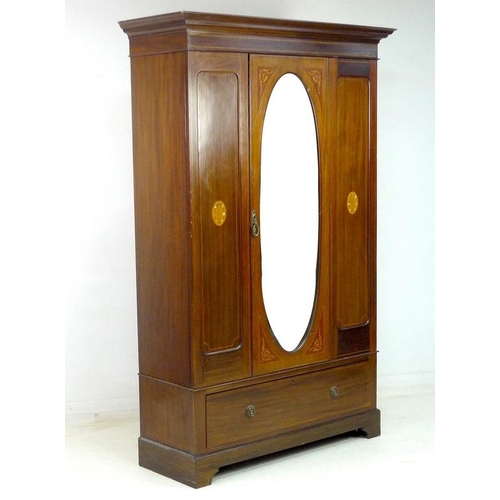 953 - An Edwardian mahogany gentleman's wardrobe, decorated with inlaid fruitwood and mother of pearl pane... 