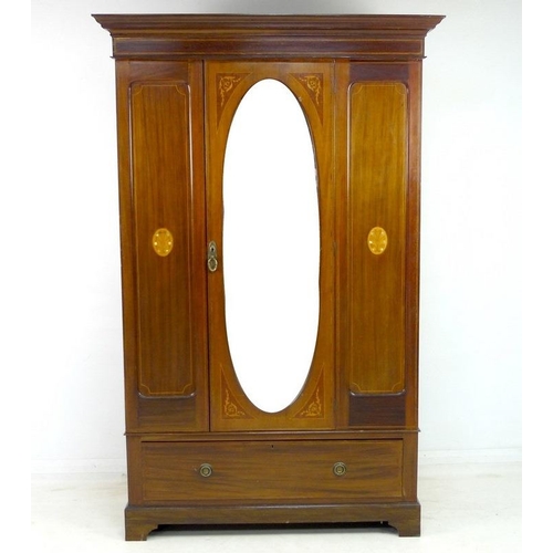 953 - An Edwardian mahogany gentleman's wardrobe, decorated with inlaid fruitwood and mother of pearl pane... 