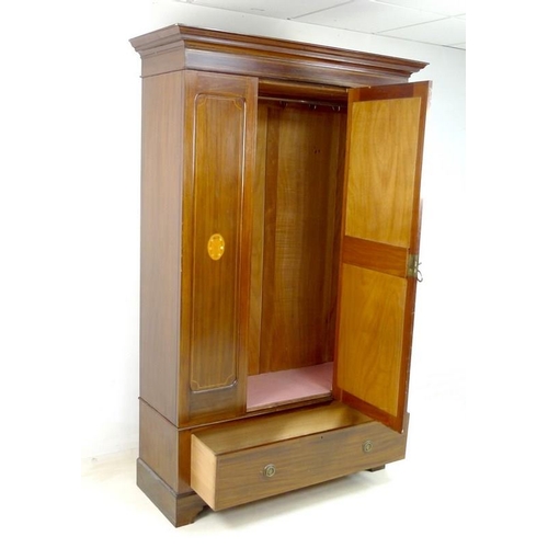 953 - An Edwardian mahogany gentleman's wardrobe, decorated with inlaid fruitwood and mother of pearl pane... 