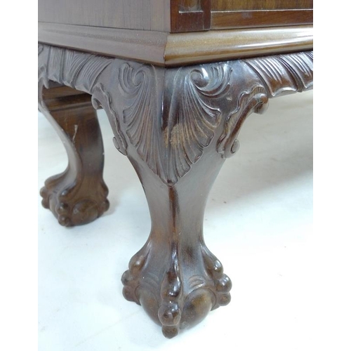 956 - A good Edwardian mahogany bookcase, outswept cornice with foliate carved decoration, beading and cus... 