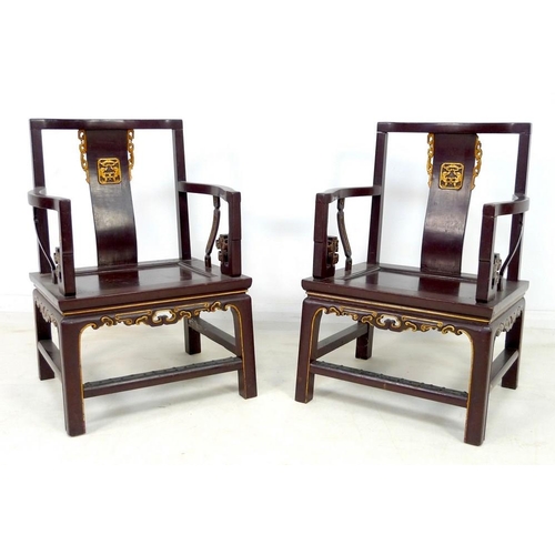 957 - A pair of Chinese hardwood low back open armchairs, Qing Dynasty, late 19th century, painted dark br... 