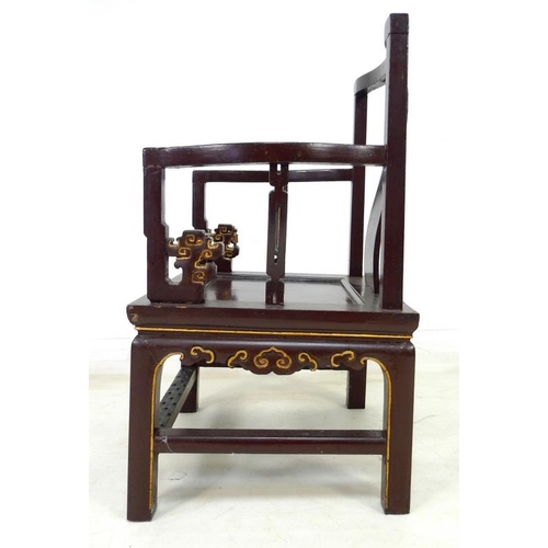 957 - A pair of Chinese hardwood low back open armchairs, Qing Dynasty, late 19th century, painted dark br... 