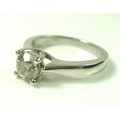 A platinum and diamond solitaire ring, the diamond of 0.96ct within a crossover setting, size N, 6.6... 