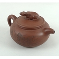A Chinese Yixing stoneware teapot and cover, late Qing / Republic period, of compressed globular for... 