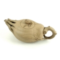 A Chinese Yixing stoneware teapot and cover, late Qing / Republic period, formed as a mandrake root,... 