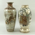 A Japanese Satsuma vase, Meiji period, the two reserves decorated with an interior scene and with a ... 