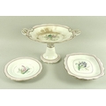 An early 19th century part dinner service, the body of each hand painted with different floral spray... 
