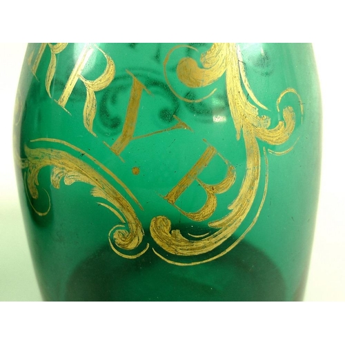 501 - A pair of George III mallet form green glass decanters and stoppers, three trailed rings to the neck... 