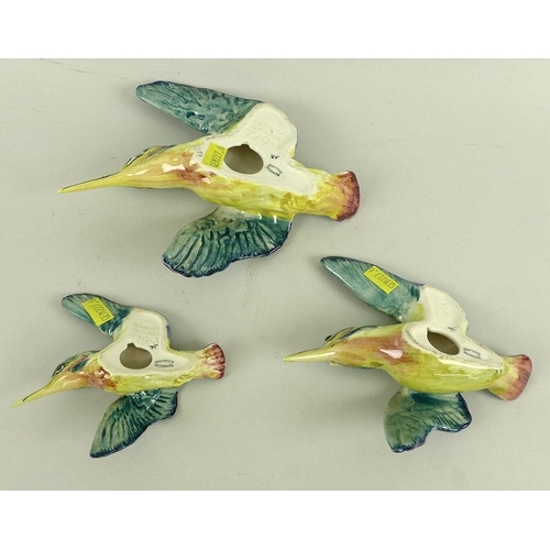 507 - A group of three Beswick kingfisher wall plaques, numbers 729-1, 729-2, and 729-3, largest 19.5 by 1... 