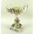 An early to mid 19th century Continental porcelain centrepiece in the style of Meissen, the body cov... 