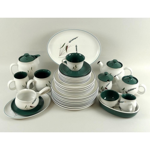 535 - A Denby part dinner service, decorated in the 'Greenwheat' pattern, comprising eight dinner plates, ... 