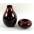 A Royal Doulton Flambe vase of ovoid form with narrow neck, decorated in dark reds with a silhouette... 