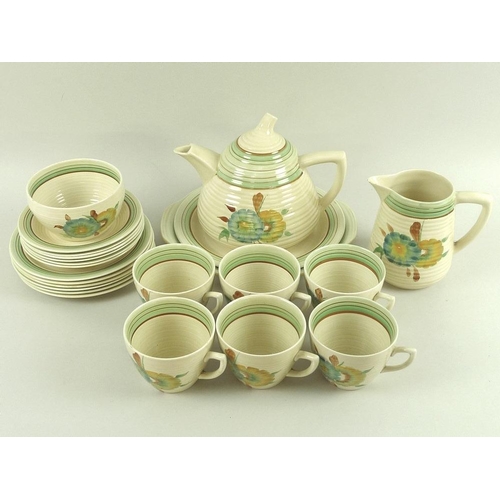 555 - A Clarice Cliff for Newport Pottery tea set, decorated in Honeydew pattern, Lynton shape, comprising... 