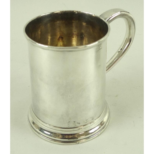 760A - A group of silver comprising a George III quarter pint tankard christening mug, London 1804, makers ... 