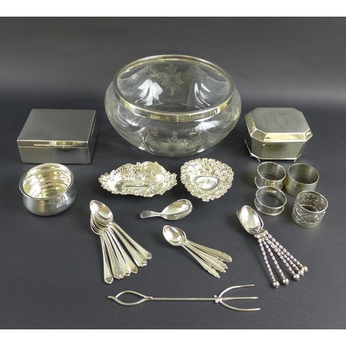 761 - A group of silver items to include a Georgian bright cut caddy spoon, an Edward VII lidded box of sa... 