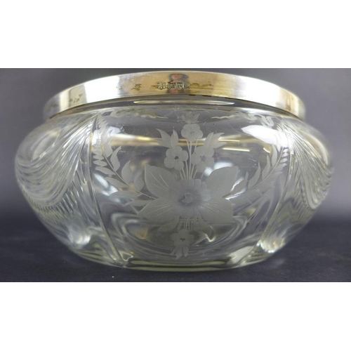 761 - A group of silver items to include a Georgian bright cut caddy spoon, an Edward VII lidded box of sa... 