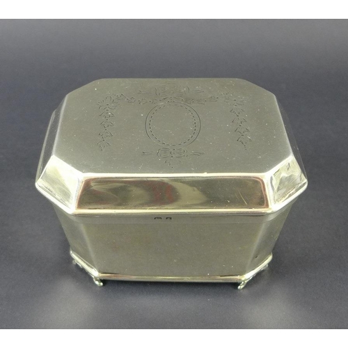 761 - A group of silver items to include a Georgian bright cut caddy spoon, an Edward VII lidded box of sa... 