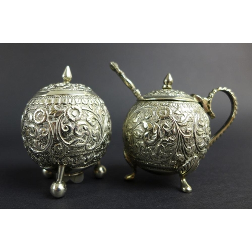 763 - A pair of Mexican silver bon bon dishes with shaped upper rims, the bases with chased and embossed A... 