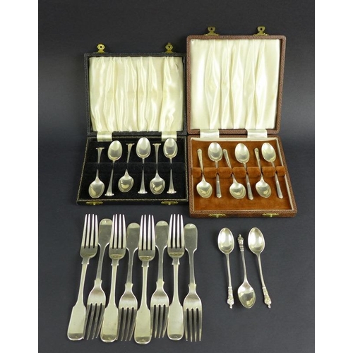 765 - A collection of Victorian and later silver cutlery, including a harlequin set of eight fiddle patter... 