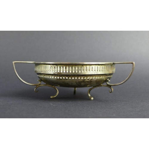 766 - A group of Victorian and later silver items comprising a beaker engraved with strap work design and ... 