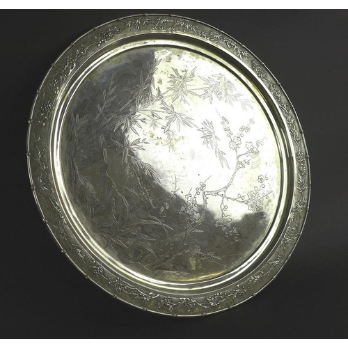 770 - A Chinese Export four piece silver tea service including tray, circa 1900, each of lobed melon form ... 