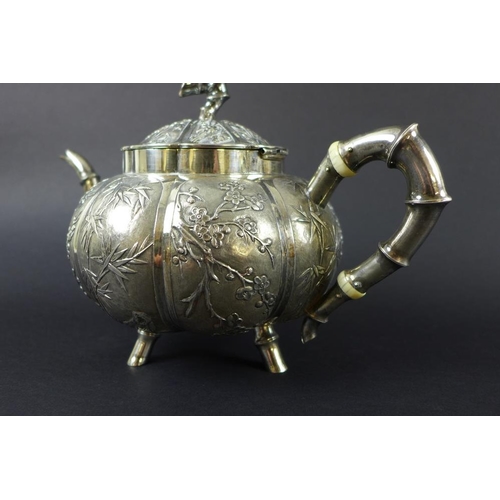 770 - A Chinese Export four piece silver tea service including tray, circa 1900, each of lobed melon form ... 