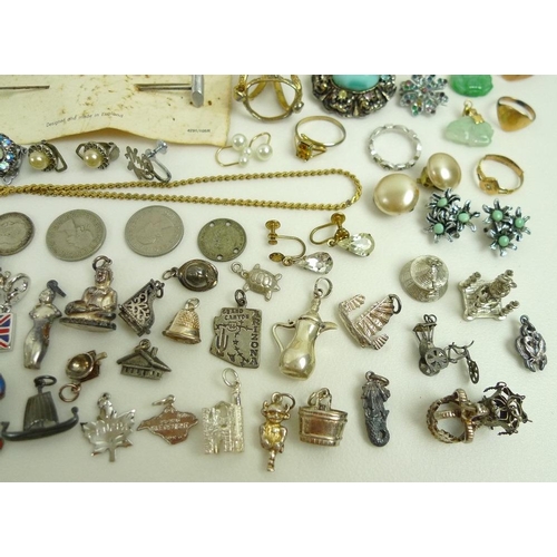 796 - A group of gold, silver and costume jewellery, including an 18ct gold ring, the heart shaped design ... 