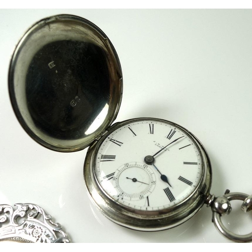 796A - A silver hunter pocket watch, the plain case engraved with shield cartouche bearing the initials FF,... 