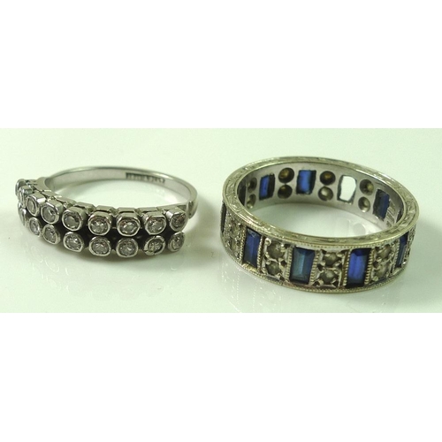 797 - A 9ct white gold eternity ring set with baguette cut sapphires alternating with white stones, Englis... 