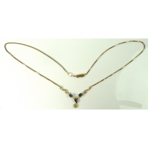 799 - An 18ct gold necklace set with blue and white stones, possibly sapphires, marked MD 750 Spain 18kt, ... 