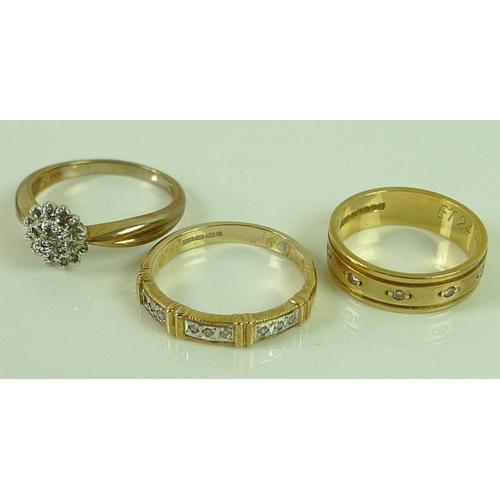 804 - An 18ct gold and diamond ring, the wide band studded with five small diamonds, size J, 3.9g, togethe... 