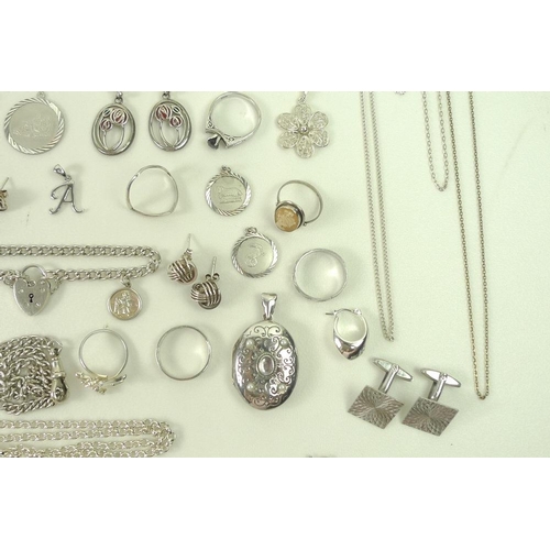 806 - A collection of silver jewellery, including earrings, necklaces, bracelets, pendants, cufflinks and ... 