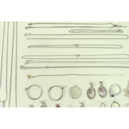 806 - A collection of silver jewellery, including earrings, necklaces, bracelets, pendants, cufflinks and ... 