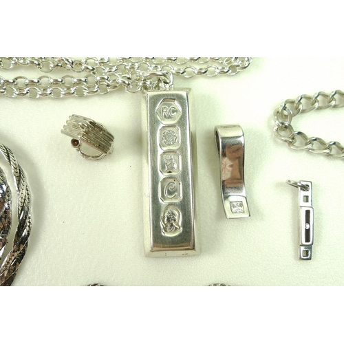 806 - A collection of silver jewellery, including earrings, necklaces, bracelets, pendants, cufflinks and ... 