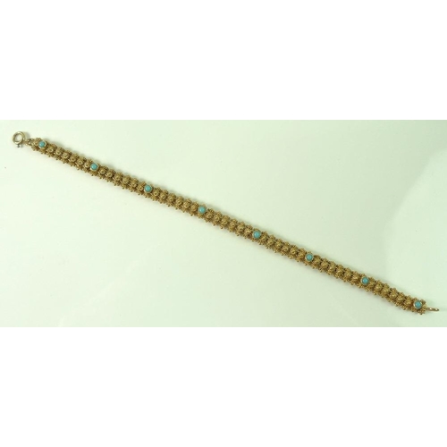 807 - A 14ct gold bracelet set with turquoise cabochons on an intricately beaded articulated band, marked ... 